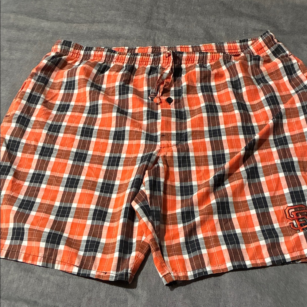 Genuine Merchandise Black and Orange Plaid Shorts